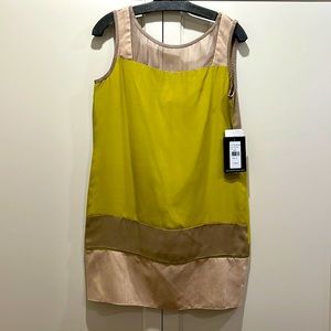 Project runway dress designed by Michelle Franklin. Size 8. Brand new with tags!